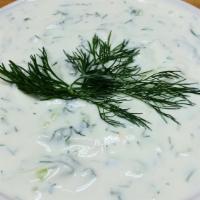 Tzatziki · A delicious, refreshing dip consisting of greek yogurt, garlic, dill, and lemon juice. (glut...