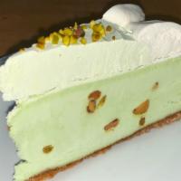 Pistachio Cheesecake (Slice) · Creamy pistachio cheesecake with pistachio pieces, topped with a light pistachio mousse and ...