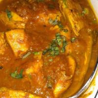 Chicken Curry · Chicken in a curry sauce. Served with rice.