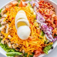 Cobb Salad · Chicken, bacon, Cheddar, tomato, cucumber, red onion, boiled egg.