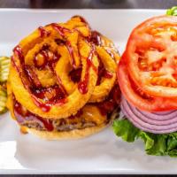 Bbq Burger · Onion rings, Cheddar, lettuce, tomato.