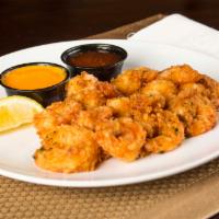 Boom Boom Shrimp · Crispy medium gulf shrimp served with sweet & spicy Thai chili sauce and a red chili pepper ...
