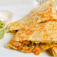 Chicken Quesadilla · Tortilla filled with chunks of chicken and cheese, flat grilled.