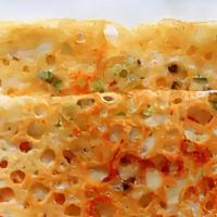 Breakfast Rava Dosa (Plain/Chilli/Onion/Carrot/Ginger) · Rice and Sooji Crepe cooked on Indian griddle