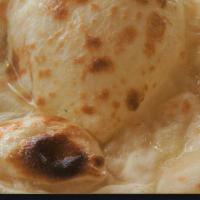 Butter Naan · Fresh Handmade Leavened white bread baked in tandoori oven with butter