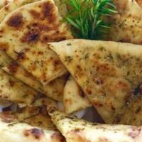 Rosemary Naan · Leavened white bread baked in tandoori oven with Rosemary