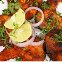 Fish Fry  · Boneless Fish with refried and sprinkled with onions, chaat masala.