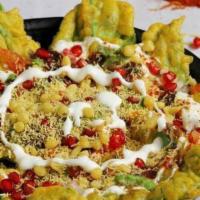 Palak Chaat  · Palak made with crispy style with spices and seasoned.