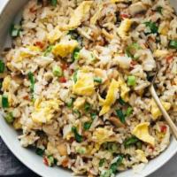 Egg Fried Rice / Schezwan Fried Rice · Stir fried rice with eggs and spring onions.