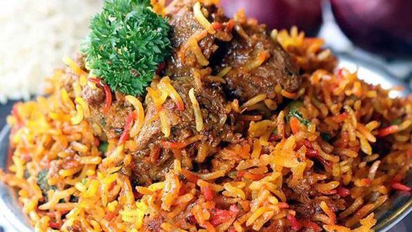 Lamb Biryani · Lamb and Basmati rice cooked with fresh herbs & spices