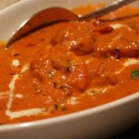 Chicken Tikka Masala · Boneless chicken pieces of cooked with cream tomatoes and mild sauce.