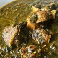 Gongura Mutton (Upon Availability) · Andhra Style goat cooked with in gongura sauce and spices.
