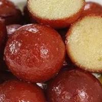 Gulab Jamun (2) · Fried milk ball dough in aromatic syrup with cardamom and rose water.