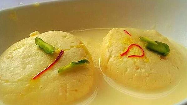 Ras Malai (2) · Cottage cheese & milk flavored with rose water & garnished with nuts