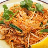 Pad Thai Noodles · Rice noodles stir-fried with egg. bean curd, bean sprouts, scalions and crushed peanut.