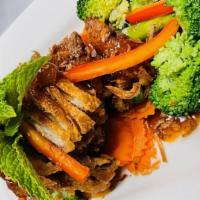 Duck Tamarind · Crispy boneless duck, moed vegetables with tangy tamarind sauce.