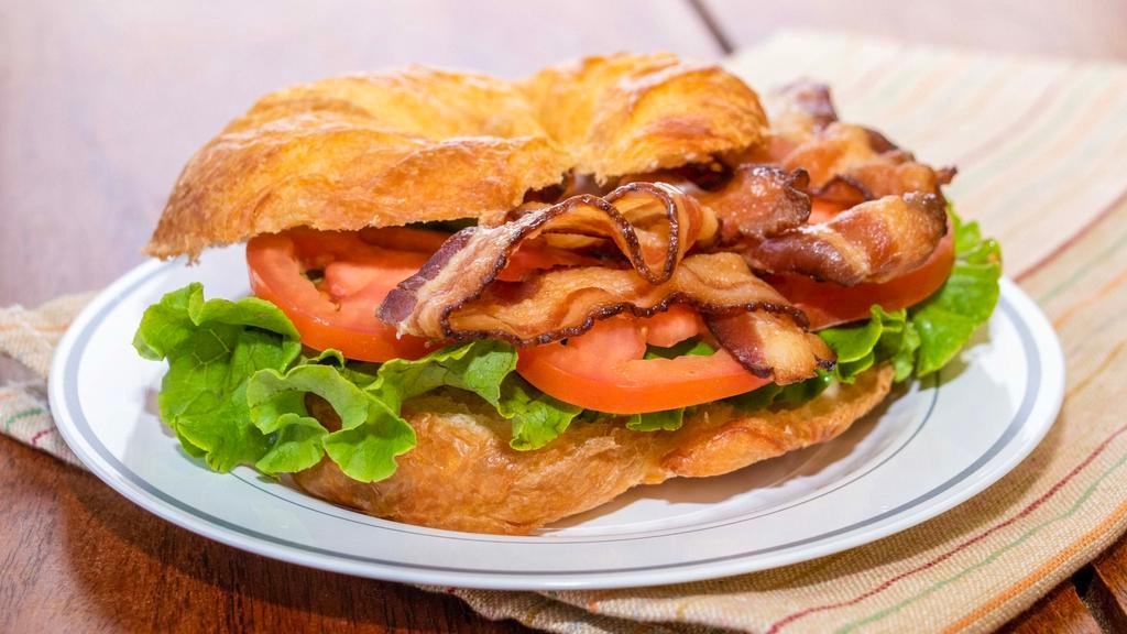 Classic B.L.T · Six slices of bacon with lettuce and tomato with your choice of bread, cheese and toppings.