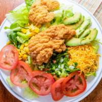 Southern Chicken Salad · Breaded chicken, avocado, lettuce, tomatoes, corn, Cheddar and pico de gallo.