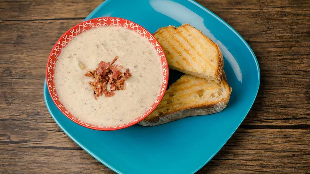 Clam Chowder · Creamy traditional clam chowder, full of all the originals: potatoes, onions, and clams. Expertly seasoned to make a gluten free chowder that even a New England native would come back for.
