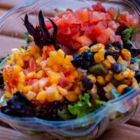 Caribbean Salad · Fresh Greens, Mango Salsa, Tomatoes, Black Bean and Corn, with Mango Dressing