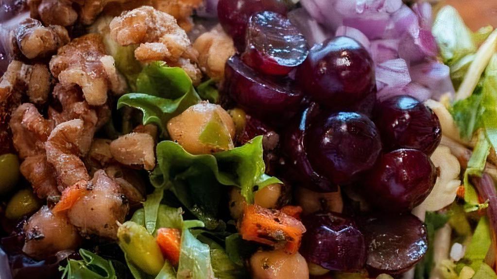 Super Green Salad · Fresh Greens, Grapes, Cranberries, Edamame, Chickpeas, Red Onion, Walnuts, Shaved Veggies with House Made Vinaigrette