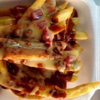 Chili Cheese Fries · Fries topped with chili and cheese.