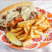 Philadelphia Cheesesteak Sub · Sirloin steak, provolone, onions, lettuce, tomato and mayo,