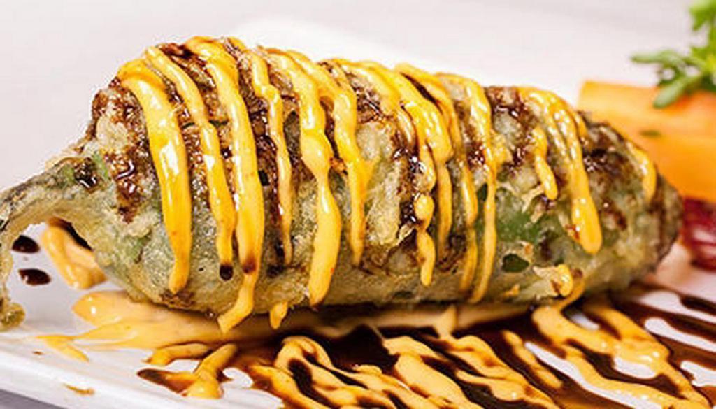 Jalapeno Firecracker · Fresh jalapeño stuffed with crab, cream cheese, tempura fried and drizzled with spicy mayo and sweet soy sauce.