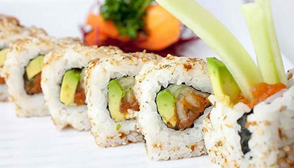 Spicy Tuna Roll · Tuna, masago, scallions, avocado and cucumber in a special spicy sauce.