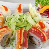 Van Gogh Roll · Spicy tuna, cucumber, avocado, kanikama, tuna, salmon, white fish, spicy mayo and sriracha o...