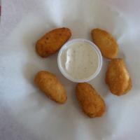 Jalapeno Poppers · 5 Pieces of Jalapeno Poppers (stuffing includes cream cheese and jalapeno) served with homem...