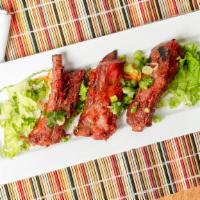 Ap13. Barbecue Spare Ribs - Sườn Nướng (3 Pieces) · With Green Onions and Peanuts