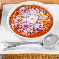 Bowl Of Chili · Big bowl of our famous housemade chili, topped with cheese, sour cream and red onions.