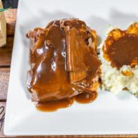 Open Face Roast Beef · Thinly slice roasted beef on top of the white bread. Served with mash and gravy.