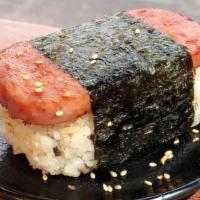 Spam Musubi · Grilled spam on top of seasoned rice, seaweed, sweet soy sauce.