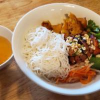 Vermicelli Bowl · With grilled pork, egg roll, and veggie.

Peanut Allergy Warning: Dish includes peanuts or o...