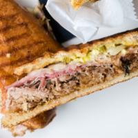 Cubano Sandwich · Slow-roasted pork shouLder, hoagie roll, swiss cheese, prosciutto, pickled jalapeños & onion...