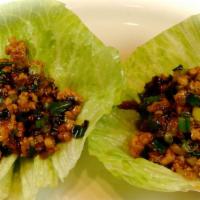 Chicken Lettuce Package · Spicy. Diced meat, celery and green onion wok seared and served in cold crisp lettuce cups.