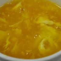 Egg Drop Soup · Flavorful chicken broth with egg flakes and niblet corns.