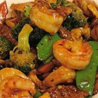 Triple Delight · Spicy. Chicken, beef and shrimp sauteed with broccoli, carrots and mushroom in a house speci...