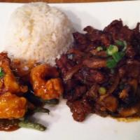 Steak And Shrimp · Tender steak slices sauteed with mushrooms and onions in a black pepper sauce and paired wit...