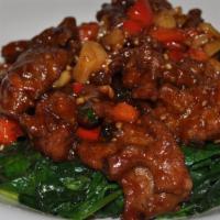 Sauteed Beef Hunan Style · Spicy. Marinated sliced beef sauteed in spicy peppercorn sauce, served over fresh baby spina...