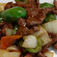 Bell Pepper Steak · Thinly sliced beef marinated and sauteed with green bell peppers and onions in a brown sauce.
