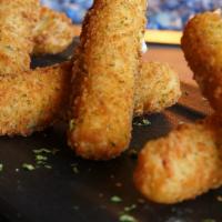 Little Dippers · Don't look in the sky, look on the table. Our yummy fried mozzarella sticks served with a si...