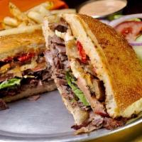 Slyce Steak Sandwich · Mozzarella cheese, mushrooms, onions &. peppers dressed with LTM