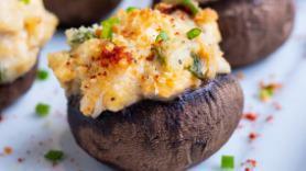 Seafood Stuffed Mushrooms · Roasted button mushrooms stuffed with a blend of seafood veggies and cheese.
