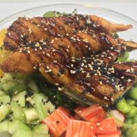 Hawaii Poke Bowl · Shrimp tempura, grilled eel, pineapple, cucumber, avocado, and seaweed salad in chef special...