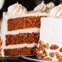 Carrot Cake · Chef Francisco’s famed recipe starts with crushed pecans and fresh, shredded carrots baked i...