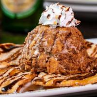 Fried Ice Cream ⭐️ · A giant scoop of deep-fried vanilla ice cream served on a homemade flour tortilla topped wit...