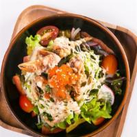 Wild Caught Crab Cake Salad · A classic combination of 2 pieces of grilled crab cake, organic crispy mix, organic romaine ...